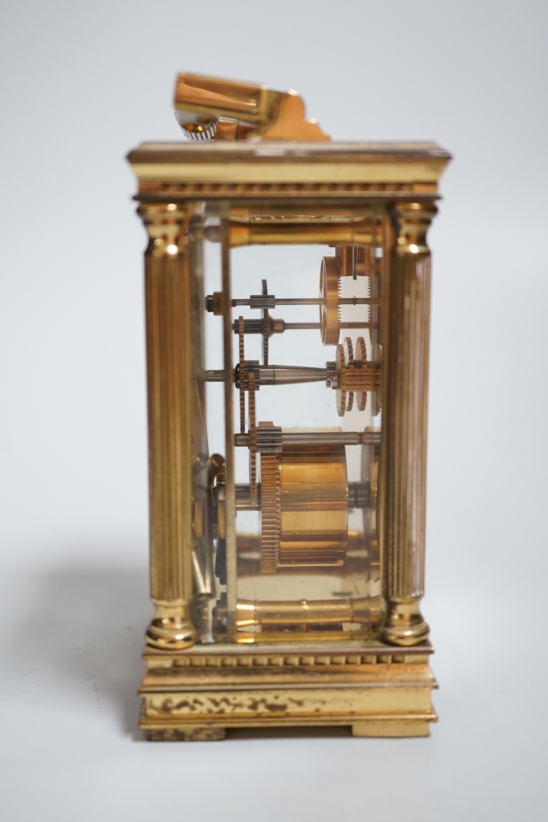 A brass mantel timepiece, retailed by Mappin and Webb, 13cm